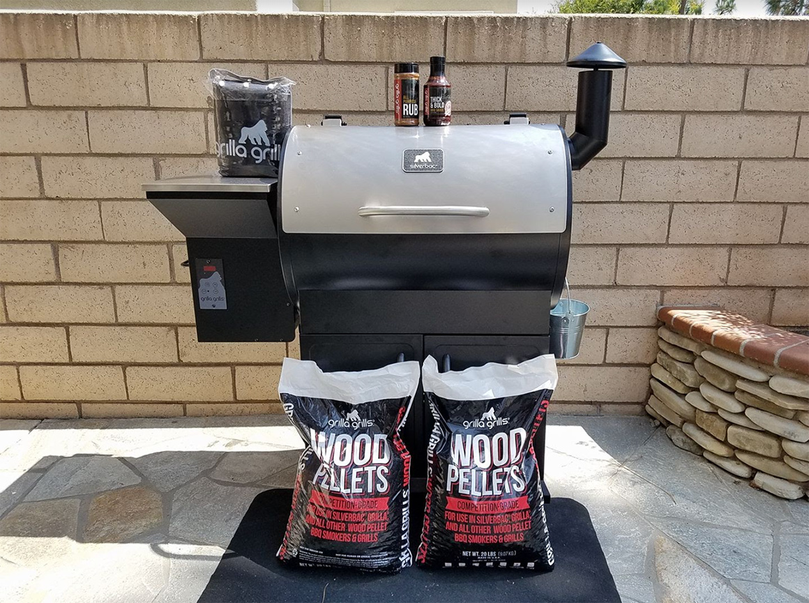 a grilla grills silverbac grill with wood pellets and a grill cover