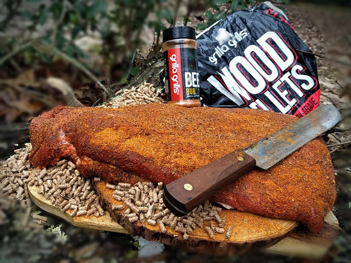a slab of beef with grilla grills dry rub and wood pellets