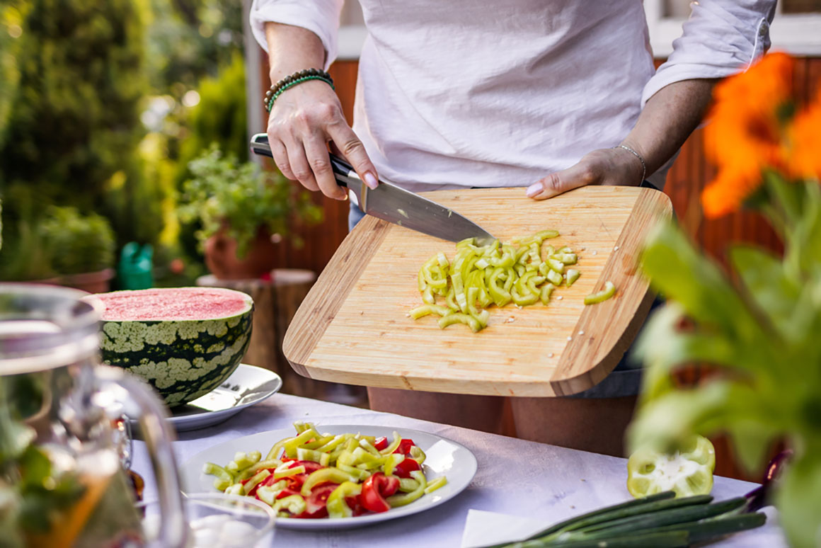 sliced veggies on cutting board