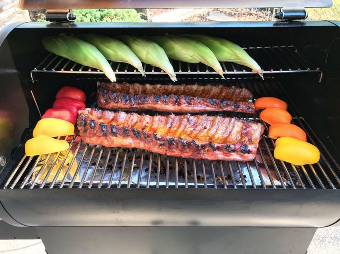 foods cooking on grill